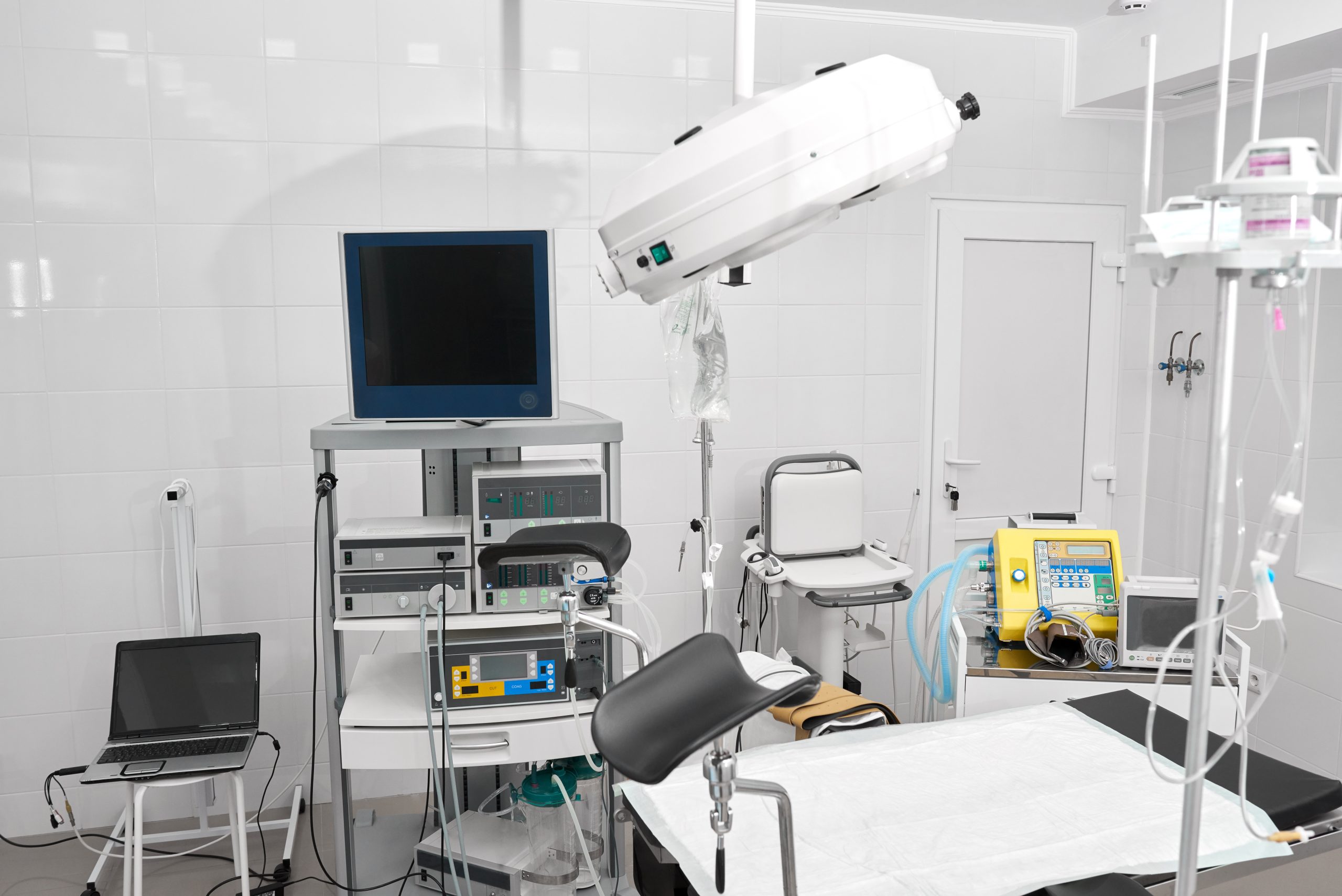 Shot of a gynecological room with chair for medical examinations and equipment medicine feminine health profession clinical hospital examine concept.